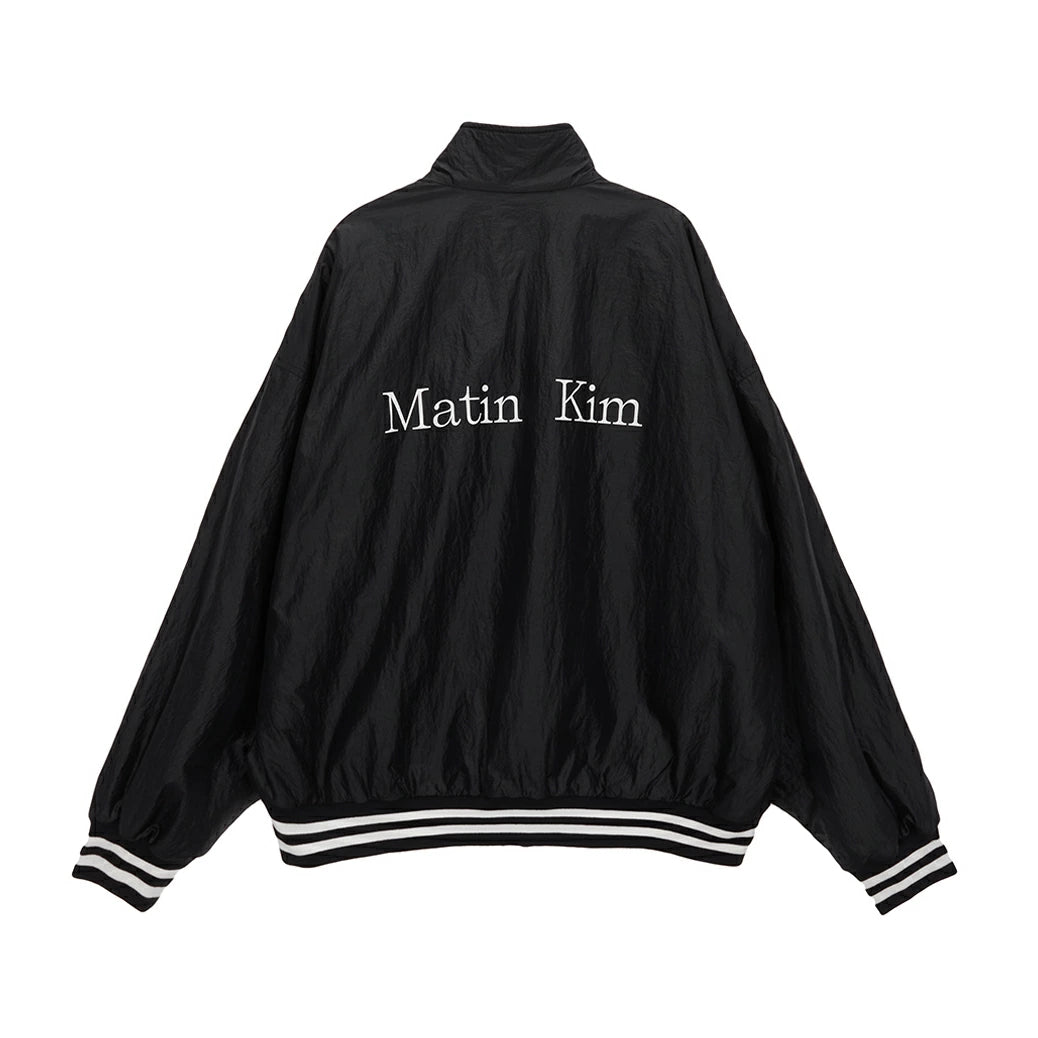 Matin Kim】REVERSIBLE COATING TRACK JUMPER